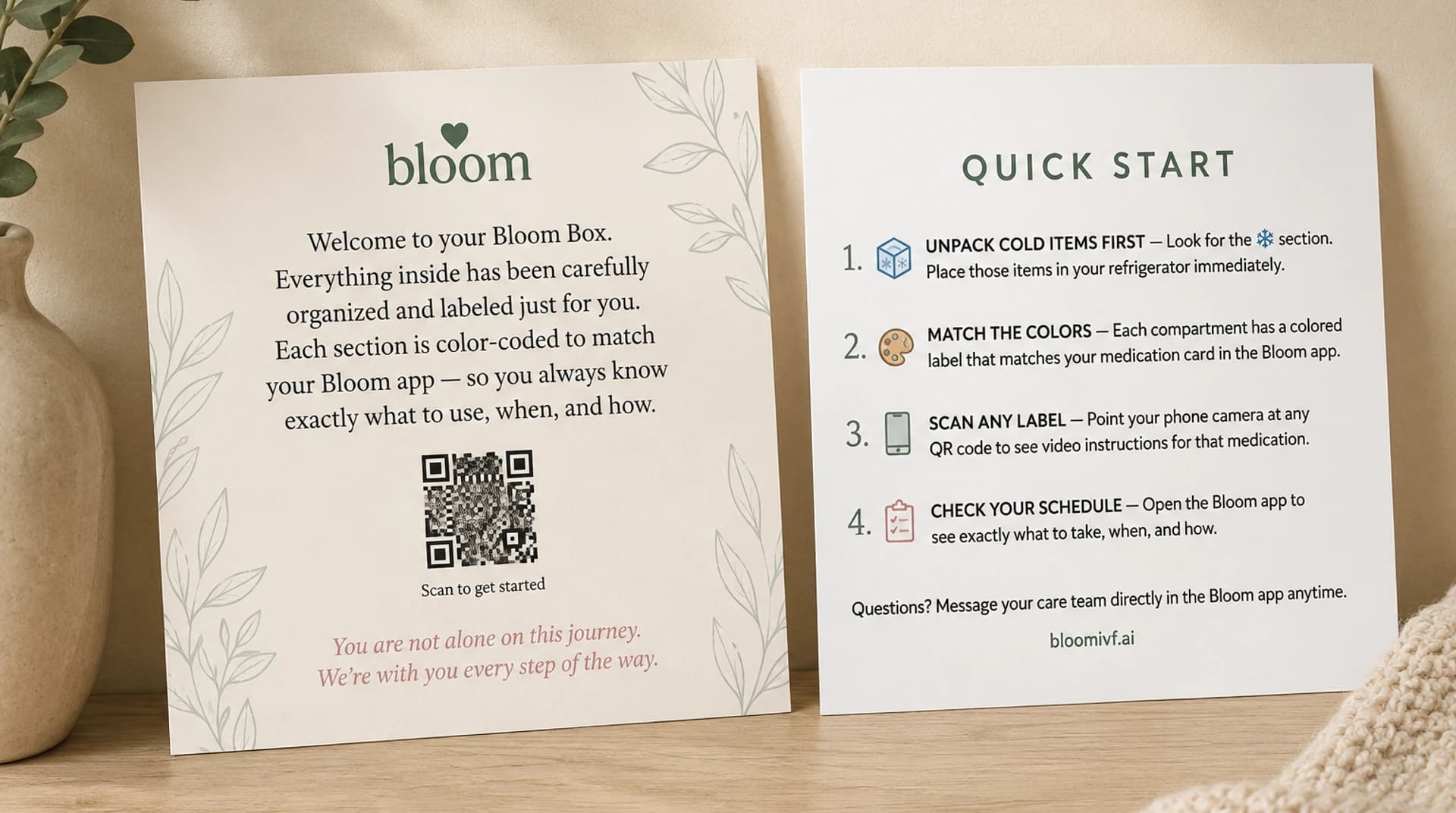 The Bloom welcome card and quick-start card tucked inside every box — 'You are not alone on this journey. We're with you every step of the way.'